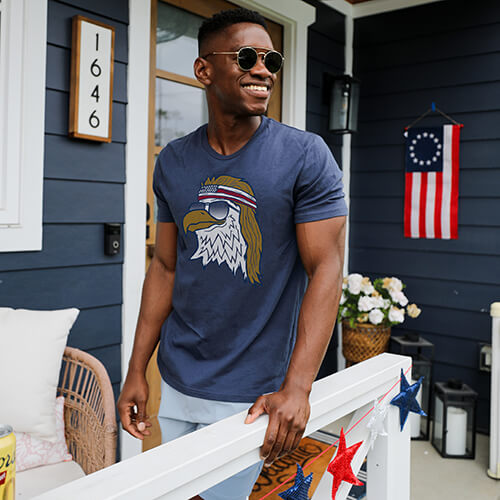 4th of july - male model wearing men's epic eagle tee and sunglasses smiling