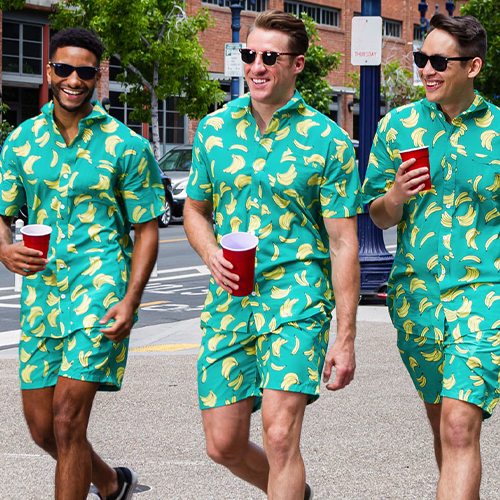shop bachelor - image of models wearing Men's Banana Havana Hawaiian Shirt and Havana Banana Stretch Swim Trunks