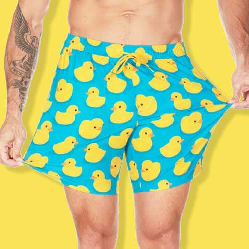 shop swim trunks - image of model wearing rubber ducky stretch swim trunks