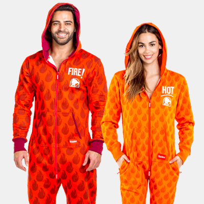 shop Taco Bell onesies - image of man wearing straight fire jumpsuit and woman wearing hot stuff jumpsuit