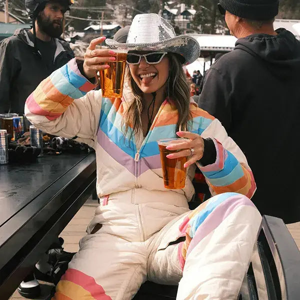 image of customer wearing our women's retro rainbow snow suit