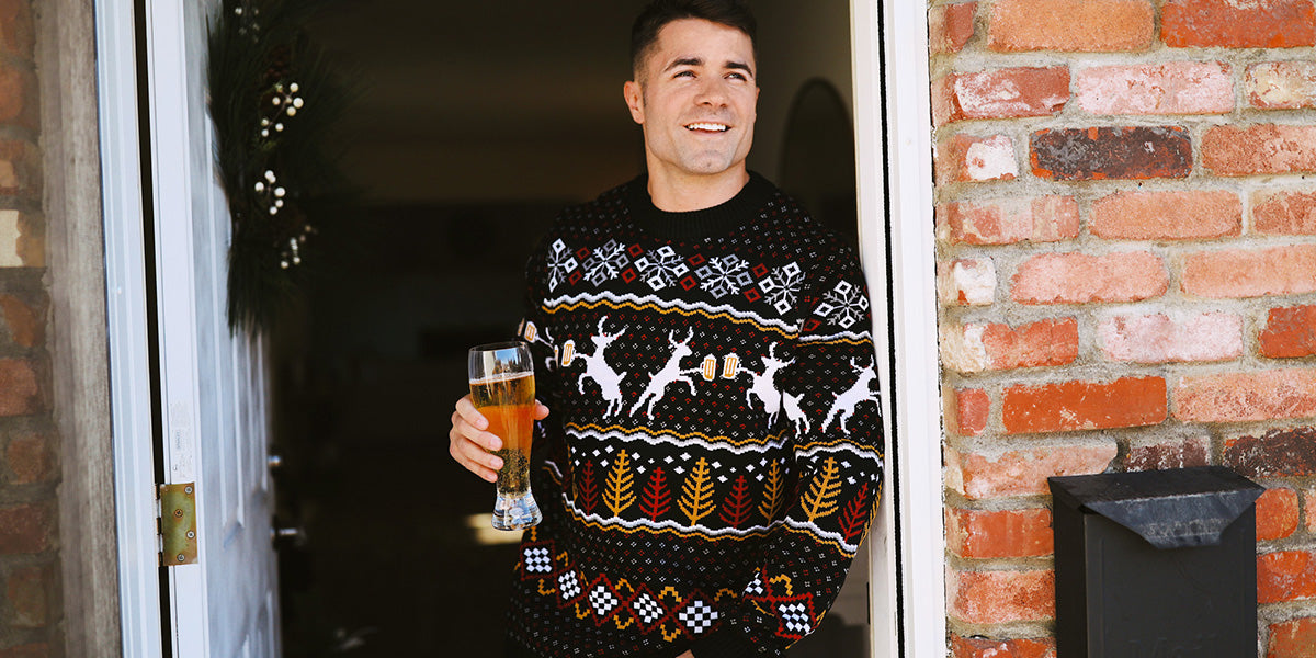image of model wearing men's caribrew ugly christmas sweater