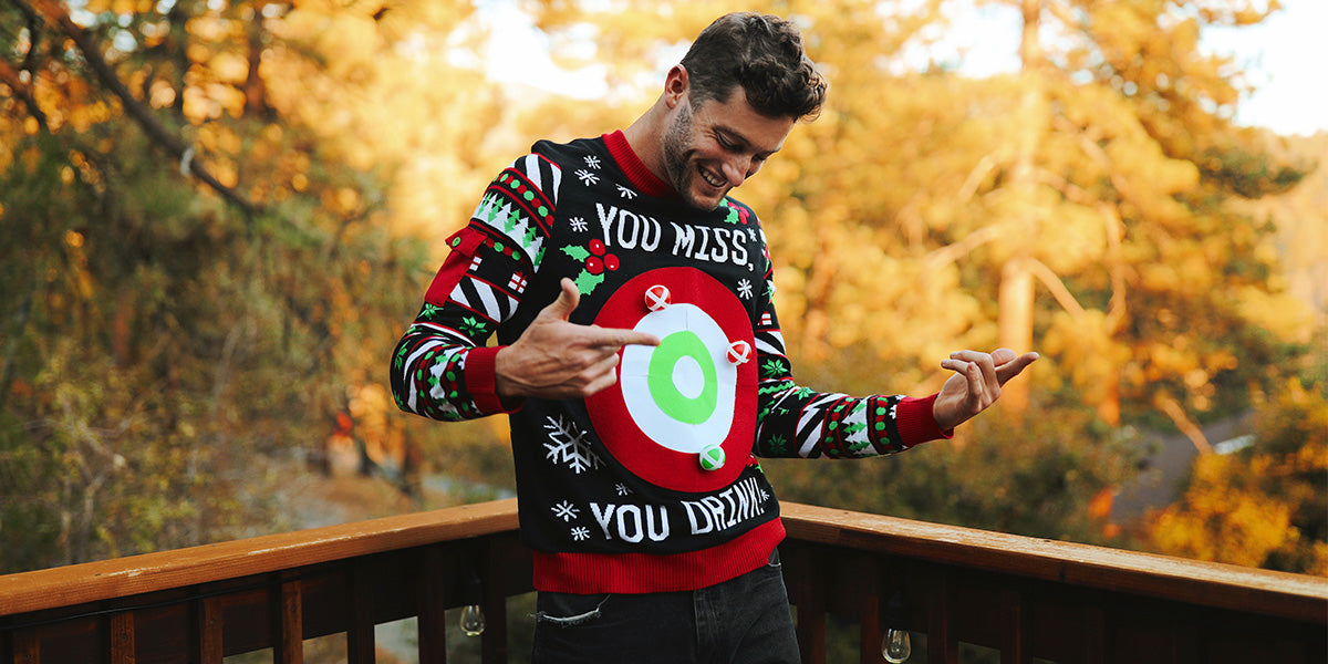 image of model wearing men's drinking game ugly christmas sweater