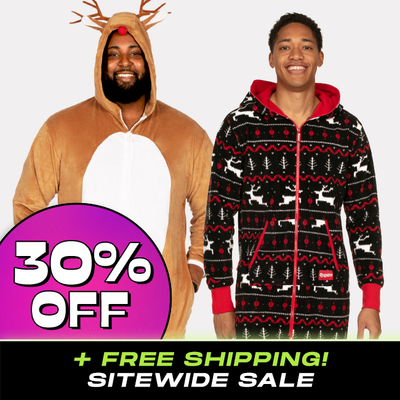 shop christmas onesies - 30% off Cyber Monday badge - models wearing men's Rudolph jumpsuit and men's black and red fair isle jumpsuit