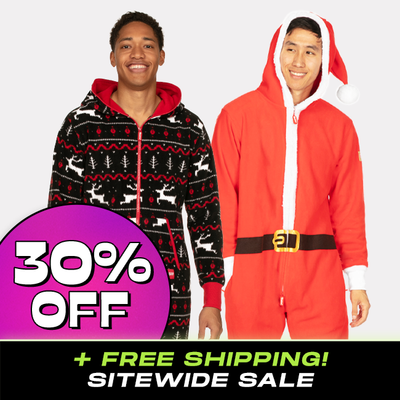 shop christmas onesies - 30% off - models wearing men's santa with fur jumpsuit and men's black and red fair isle jumpsuit