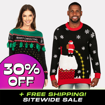 shop christmas sweaters- 30% off Cyber Monday badge - models wearing men's leaky roof light up ugly christmas sweater and women's christmas tree tassel ugly christmas sweater