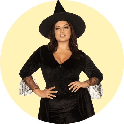 shop plus size costumes - image of model wearing womens plus size witch costume