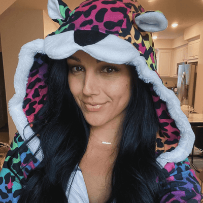 image of customer wearing womens 90's leopard costume