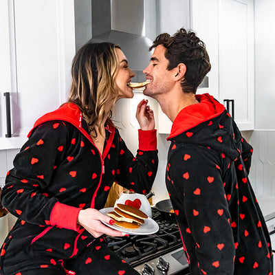 shop Valentine's Day - image of man and woman wearing hearts on fire jumpsuit
