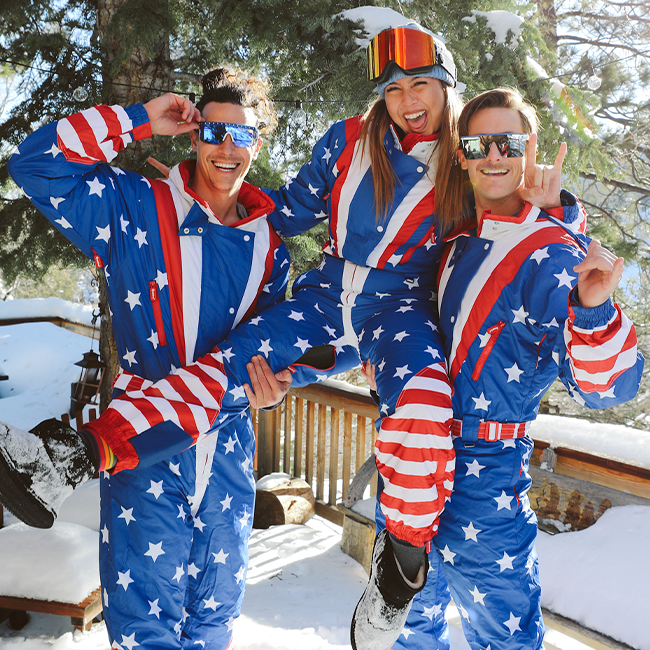 shop ski and snow suits - models wearing men's and women's americana snow suits
