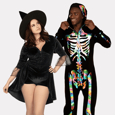 shop costumes - models wearing women's witch costume and men's iridescent skeleton costume