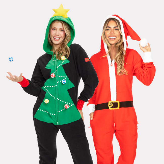 shop onesies - models wearing women's christmas tree toss game and women's santa jumpsuits