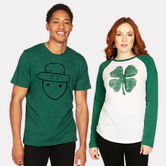 shop graphic tees - models wearing men's leprechaun sketch tee and women's lucky clover long sleeve shirt