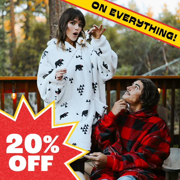 shop 20% off loungewear - image of model wearing beary christmas blanket hoodie