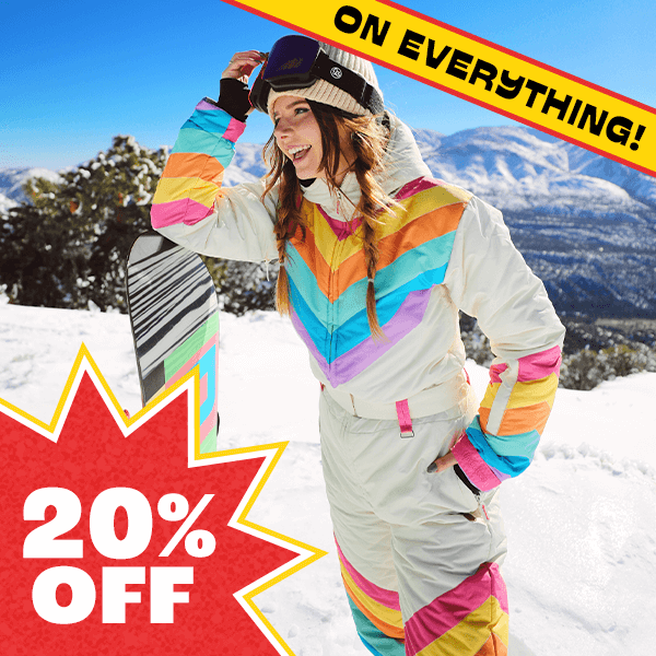 shop 20% off snow suits - image of model wearing womens retro rainbow snow suit