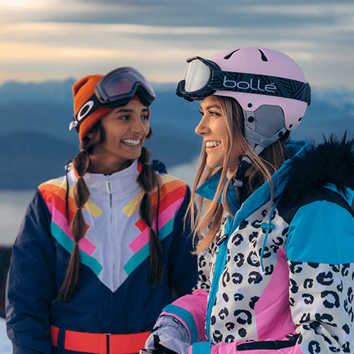shop ski and snow collection - image of two women wearing snow suits