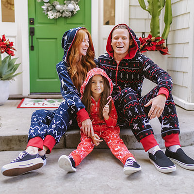 shop kids (4-12 yrs) - image of a girl wearing red fair isle jumpsuit with her family