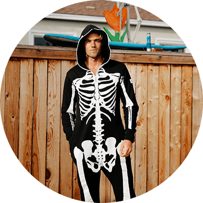 shop skeleton costumes - image of man wearing skeleton onesie
